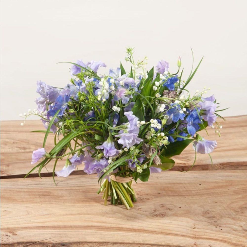 Bouquet de muguets et fleurs de saison