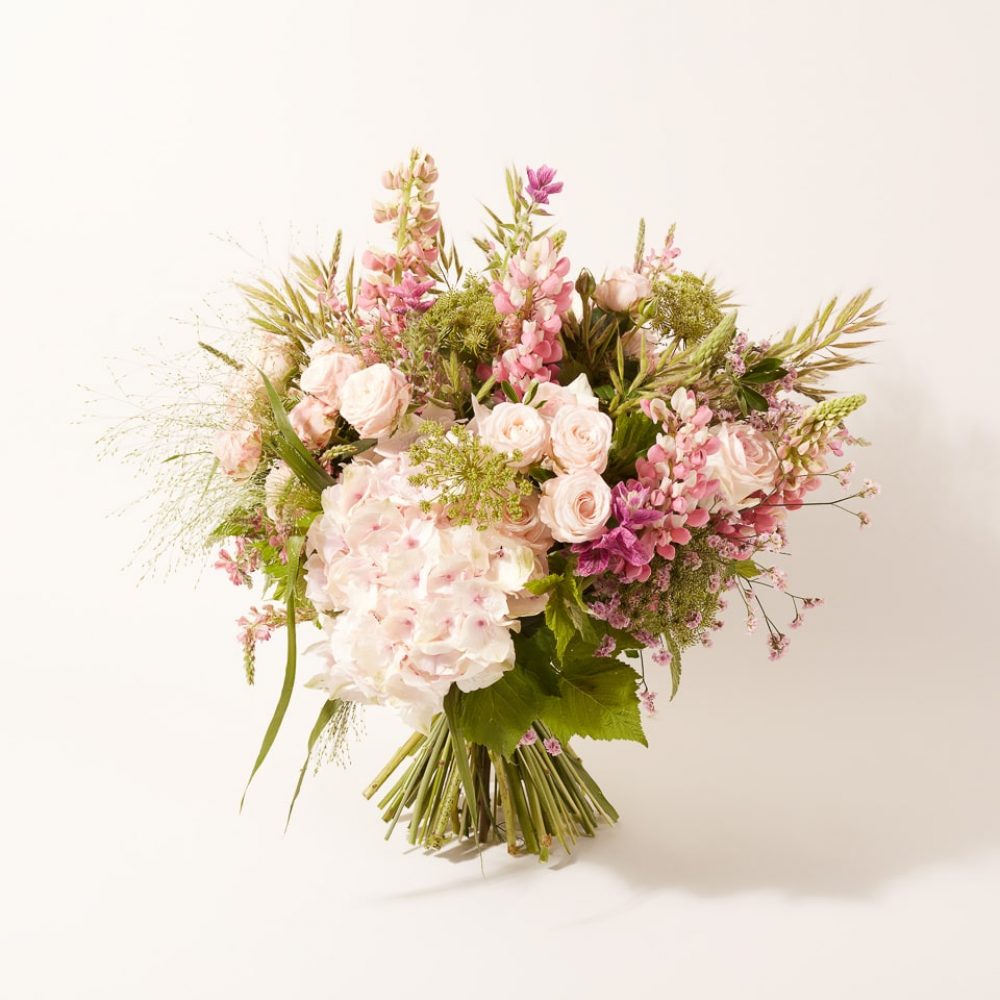 Bouquet of plants and seasonal flowers